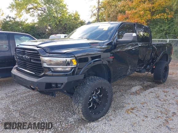 ✅ 2022 Ram 2500 Laramie • VIN: 3C6UR5FL1NG327295 • Lot: 43548472. Listed on IAAI with 107,821 mi. Free auction sales archive from the USA and detailed vehicle history report at DreamBid. Image 2.