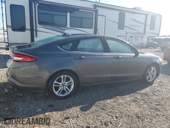 ✅ 2018 Ford Fusion SE • VIN: 3FA6P0H79JR152065 • Лот: 46472035. Опубликован ранее на Copart с пробегом Не указан. Бесплатный доступ к архиву аукционных продаж из США и подробный отчёт об истории автомобиля на DreamBid. Изображение 3.