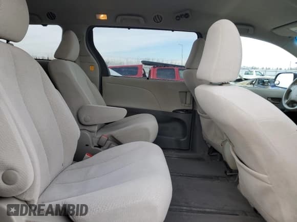 ✅ 2012 Toyota Sienna LE • VIN: 5TDJK3DC7CS039741 • Lot: 91675575. Listed on Copart with 215,437 mi. Free auction sales archive from the USA and detailed vehicle history report at DreamBid. Image 11.