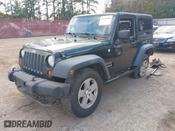 ✅ 2010 Jeep Wrangler Mountain • VIN: 1J4AA2D15AL233298 • Lot: 43615688. Listed on IAAI with 163,076 mi. Free auction sales archive from the USA and detailed vehicle history report at DreamBid. Image 17.