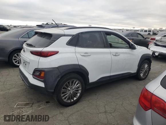 ✅ 2018 Hyundai Kona SEL • VIN: KM8K62AA1JU074205 • Лот: 69294924. Опубликован ранее на Copart с пробегом 96 288 миль. Бесплатный доступ к архиву аукционных продаж из США и подробный отчёт об истории автомобиля на DreamBid. Изображение 3.