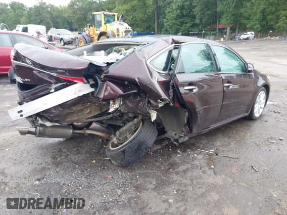 ✅ 2013 Toyota Avalon XLE • VIN: 4T1BK1EB5DU077492 • Lot: 42707470. Listed on IAAI with 182,828 mi. Free auction sales archive from the USA and detailed vehicle history report at DreamBid. Image 4.