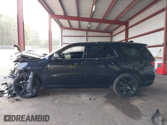 2021 Dodge Durango R/T with VIN 1C4SDJCT9MC547152, listed as a IAAI auction lot 42919209 with 82,920 mi miles and . Bid and sale history available at DreamBid. Image 14.