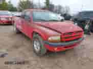 2002 Dodge Dakota Sport z VIN 1B7GL32XX2S558947, wystawiony jako IAAI lot #41538339 z przebiegiem 126 150 mil mil oraz . Historia ofert i sprzedaży dostępna na DreamBid. Obrazek 1.