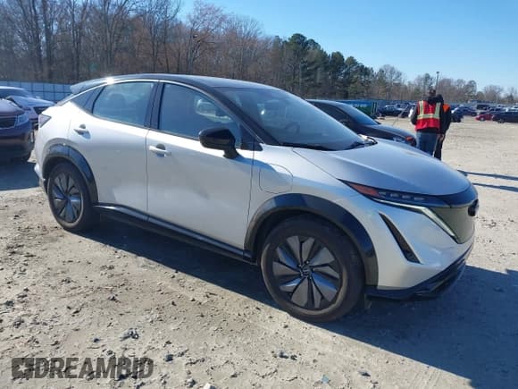 ✅ 2023 Nissan ARIYA Evolve+ • VIN: JN1DF0BB9PM710826 • Lot: 41593992. Listed on IAAI with 12,601 mi. Free auction sales archive from the USA and detailed vehicle history report at DreamBid. Image 1.