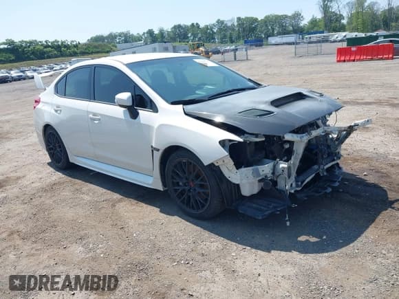 ✅ 2017 Subaru WRX STI • VIN: JF1VA2M64H9831592 • Lot: 42424726. Listed on IAAI with 90,595 mi. Free auction sales archive from the USA and detailed vehicle history report at DreamBid. Image 1.