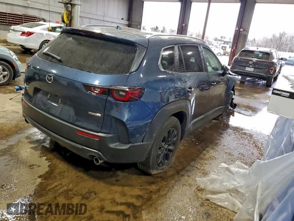 ✅ 2025 Mazda CX-50 S Premium • VIN: 7MMVABDM8SN336819 • Lot: 92750175. Listed on Copart with 10,465 mi. Free auction sales archive from the USA and detailed vehicle history report at DreamBid. Image 3.