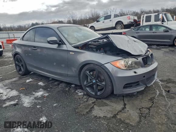 ✅ 2011 BMW 1 Series 135i • VIN: WBAUC9C54BVM09206 • Lot: 95210915. Listed on Copart with 141,906 mi. Free auction sales archive from the USA and detailed vehicle history report at DreamBid. Image 4.
