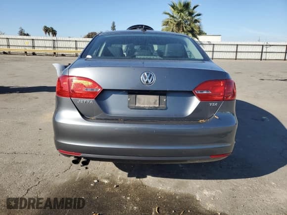 ✅ 2014 Volkswagen Jetta TDI • VIN: 3VWLL7AJ9EM391171 • Lot: 90758135. Listed on Copart with 106,874 mi. Free auction sales archive from the USA and detailed vehicle history report at DreamBid. Image 6.