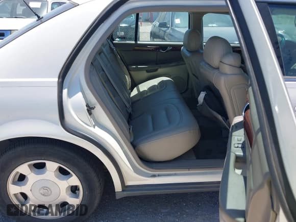 ✅ 2002 Cadillac DeVille • VIN: 1G6KD54Y52U251010 • Lot: 42817879. Listed on IAAI with 100,397 mi. Free auction sales archive from the USA and detailed vehicle history report at DreamBid. Image 8.