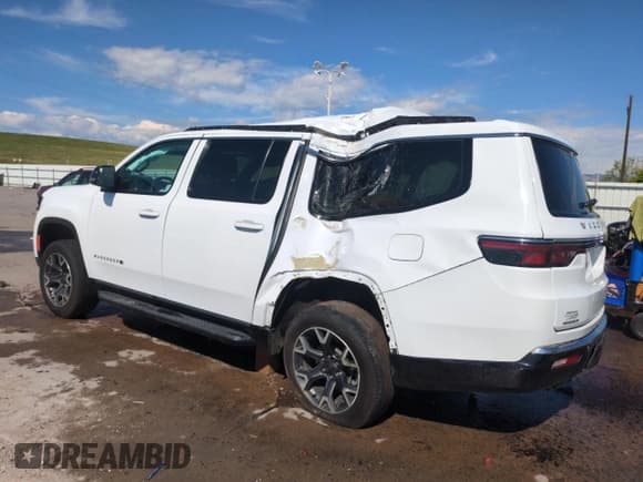 ✅ 2023 Jeep Wagoneer Series III • VIN: 1C4SJSDP8PS540588 • Lot: 56546295. Listed on Copart with 47,041 mi. Free auction sales archive from the USA and detailed vehicle history report at DreamBid. Image 2.