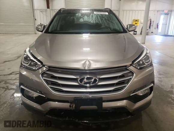 ✅ 2018 Hyundai Santa Fe Ultimate • VIN: 5XYZWDLA4JG554817 • Lot: 59900594. Listed on Copart with 33,137 mi. Free auction sales archive from the USA and detailed vehicle history report at DreamBid. Image 5.