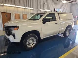 2023 Chevrolet Silverado 1500 Work Truck z VIN 3GCNAAEKXPG363236, wystawiony jako Copart lot #86328925 z przebiegiem 240 529 mil mil oraz Czysty tytuł • Clean title. Historia ofert i sprzedaży dostępna na DreamBid. Obrazek 1.
