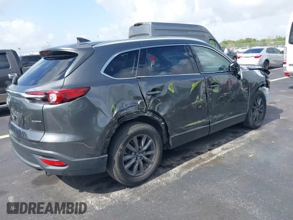 ✅ 2021 Mazda CX-9 Touring • VIN: JM3TCACY1M0503979 • Lot: 42650572. Wystawiony na IAAI z przebiegiem 28 673 mil. Bezpłatny archiwum sprzedaży aukcyjnych z USA i szczegółowy raport historii pojazdu na DreamBid. Zdjęcie 4.