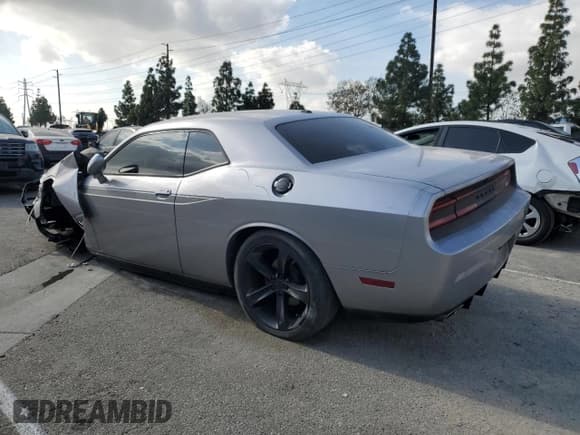 ✅ 2014 Dodge Challenger SXT • VIN: 2C3CDYAG1EH101194 • Lot: 84743424. Wystawiony na Copart z przebiegiem 135 233 mil. Bezpłatny archiwum sprzedaży aukcyjnych z USA i szczegółowy raport historii pojazdu na DreamBid. Zdjęcie 2.