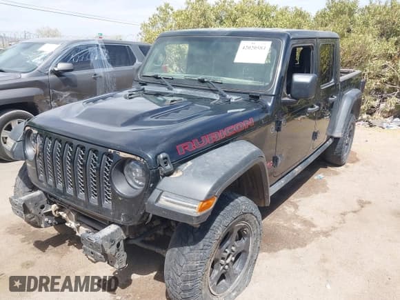 ✅ 2022 Jeep Gladiator Rubicon • VIN: 1C6JJTBM3NL165377 • Lot: 42020584. Listed on IAAI with 87,433 mi. Free auction sales archive from the USA and detailed vehicle history report at DreamBid. Image 2.