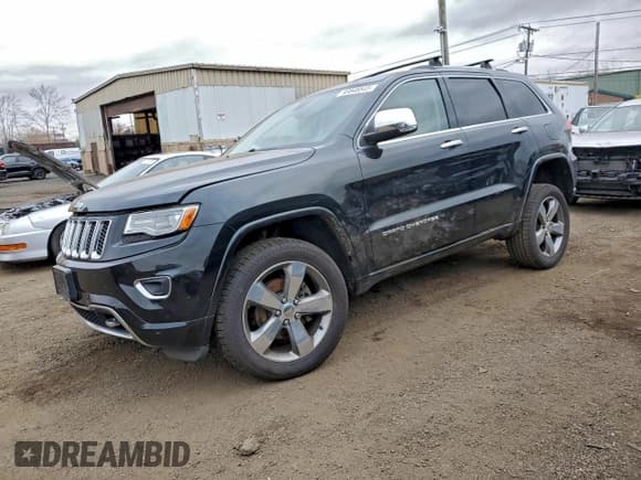✅ 2014 Jeep Grand Cherokee Overland • VIN: 1C4RJFCG0EC437700 • Lot: 93848545. Wystawiony na Copart z przebiegiem 136 887 mil. Bezpłatny archiwum sprzedaży aukcyjnych z USA i szczegółowy raport historii pojazdu na DreamBid. Zdjęcie 1.