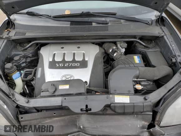 2007 Hyundai Tucson SE with VIN KM8JN72D57U518473, listed as a Copart auction lot 71998814 with 106,340 mi miles and Salvage title. Bid and sale history available at DreamBid. Image 13.