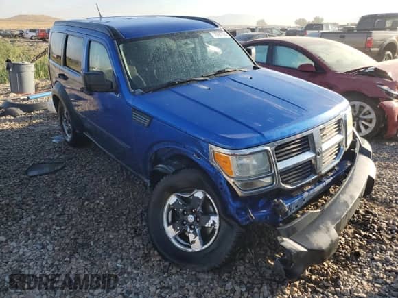 2007 Dodge Nitro SXT z VIN 1D8GU28K37W643388, wystawiony jako Copart lot #70687594 z przebiegiem 139 134 mil mil oraz Szkoda całkowita • Salvage title. Historia ofert i sprzedaży dostępna na DreamBid. Obrazek 4.