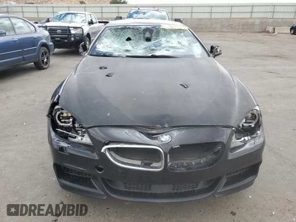 ✅ 2015 BMW 6 Series 650i • VIN: WBA6B2C57FGB99541 • Lot: 56125565. Wystawiony na Copart z przebiegiem 170 832 mil. Bezpłatny archiwum sprzedaży aukcyjnych z USA i szczegółowy raport historii pojazdu na DreamBid. Zdjęcie 5.