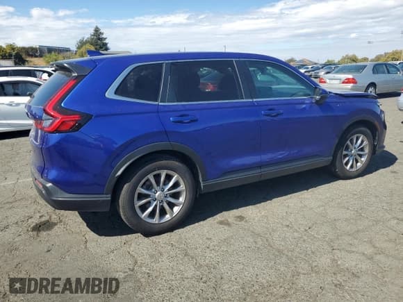 ✅ 2023 Honda CR-V EX • VIN: 2HKRS3H44PH304553 • Lot: 82066145. Listed on Copart with 33,785 mi. Free auction sales archive from the USA and detailed vehicle history report at DreamBid. Image 3.