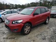 ✅ 2012 Hyundai Santa Fe GLS • VIN: 5XYZGDAB5CG126802 • Lot: 84213044. Listed on Copart with 185,397 mi. Free auction sales archive from the USA and detailed vehicle history report at DreamBid. Image 1.