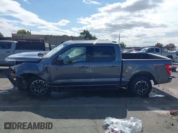 ✅ 2021 Ford F-150 Lariat • VIN: 1FTFW1ED2MFC95986 • Lot: 43433024. Listed on IAAI with 118,706 mi. Free auction sales archive from the USA and detailed vehicle history report at DreamBid. Image 14.