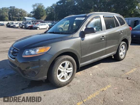 2010 Hyundai Santa Fe GLS с VIN 5NMSGDAB4AH411639, выставлен на аукционе Copart как лот 74594084 с пробегом 104 258 миль миль и Списание • Salvage title. История ставок и продаж доступна на DreamBid. Изображение 1.