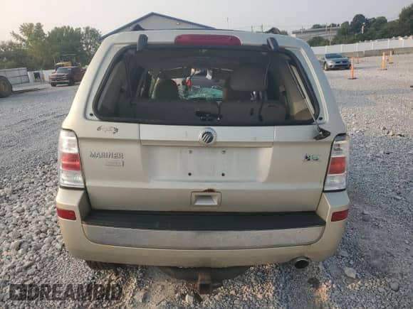 2010 Mercury Mariner Premier с VIN 4M2CN9HG4AKJ12675, выставлен на аукционе Copart как лот 71417445 с пробегом Не указан миль и Списание • Salvage title. История ставок и продаж доступна на DreamBid. Изображение 6.