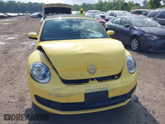 ✅ 2013 Volkswagen Beetle 2.5L • VIN: 3VW5X7AT3DM831303 • Лот: 42680530. Опубликован ранее на IAAI с пробегом 100 041 миль. Бесплатный доступ к архиву аукционных продаж из США и подробный отчёт об истории автомобиля на DreamBid. Изображение 6.