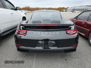 ✅ 2017 Porsche 911 Turbo S • VIN: WP0AD2A95HS167360 • Lot: 86816865. Wystawiony na Copart z przebiegiem 18 478 mil. Bezpłatny archiwum sprzedaży aukcyjnych z USA i szczegółowy raport historii pojazdu na DreamBid. Zdjęcie 6.