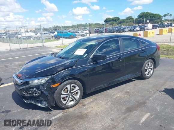✅ 2018 Honda Civic LX • VIN: 2HGFC2F54JH569237 • Lot: 43529414. Listed on IAAI with 82,546 mi. Free auction sales archive from the USA and detailed vehicle history report at DreamBid. Image 17.