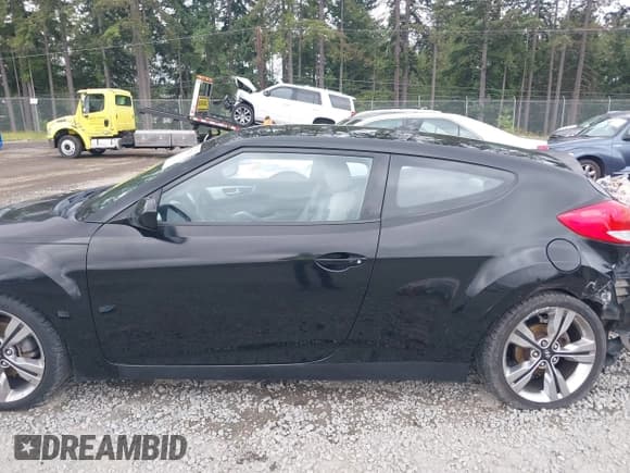 ✅ 2012 Hyundai Veloster w/Gray Int • VIN: KMHTC6AD4CU062034 • Lot: 42371790. Wystawiony na IAAI z przebiegiem 116 861 mil. Bezpłatny archiwum sprzedaży aukcyjnych z USA i szczegółowy raport historii pojazdu na DreamBid. Zdjęcie 14.