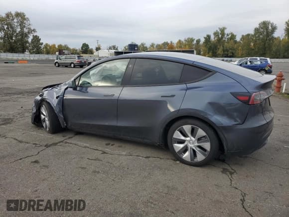 ✅ 2023 Tesla Model Y Long Range • VIN: 7SAYGDEEXPA161204 • Лот: 90365035. Опубликован ранее на Copart с пробегом 32 683 миль. Бесплатный доступ к архиву аукционных продаж из США и подробный отчёт об истории автомобиля на DreamBid. Изображение 2.