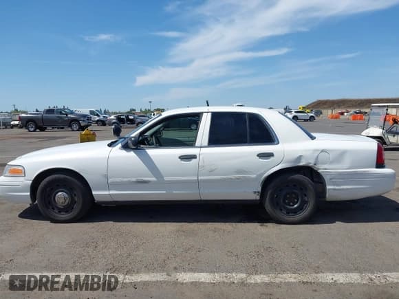 ✅ 2003 Ford Police Interceptor Street Appear • VIN: 2FAHP71W83X210044 • Lot: 42360011. Listed on IAAI with 183,569 mi. Free auction sales archive from the USA and detailed vehicle history report at DreamBid. Image 14.