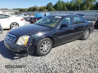 ✅ 2006 Cadillac DTS 1SC • VIN: 1G6KD57Y46U133404 • Lot: 87477645. Listed on Copart with 113,083 mi. Free auction sales archive from the USA and detailed vehicle history report at DreamBid. Image 1.