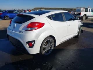 ✅ 2016 Hyundai Veloster Turbo Rally Edition • VIN: KMHTC6AE0GU292751 • Lot: 41338225. Listed on IAAI with 61,688 mi. Free auction sales archive from the USA and detailed vehicle history report at DreamBid. Image 4.