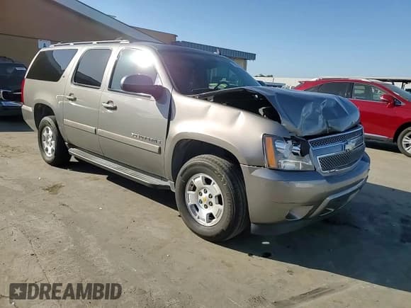 ✅ 2009 Chevrolet Suburban 2LT • VIN: 1GNFK26359J119663 • Lot: 73777444. Wystawiony na Copart z przebiegiem 180 851 mil. Bezpłatny archiwum sprzedaży aukcyjnych z USA i szczegółowy raport historii pojazdu na DreamBid. Zdjęcie 12.
