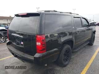 2010 Chevrolet Suburban LT z VIN 1GNUCJE02AR250318, wystawiony jako IAAI lot #43428825 z przebiegiem 187 450 mil mil oraz . Historia ofert i sprzedaży dostępna na DreamBid. Obrazek 4.