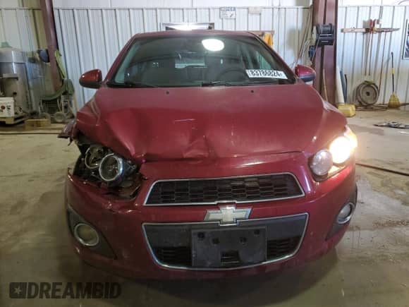 2013 Chevrolet Sonic LT с VIN 1G1JD6SH5D4130913, выставлен на аукционе Copart как лот 83786824 с пробегом 186 881 миль миль и Списание • Salvage title. История ставок и продаж доступна на DreamBid. Изображение 5.