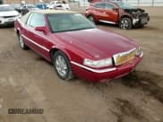 ✅ 2002 Cadillac Eldorado ESC • VIN: 1G6EL12Y22B101556 • Lot: 65088825. Listed on Copart with 107,057 mi. Free auction sales archive from the USA and detailed vehicle history report at DreamBid. Image 13.
