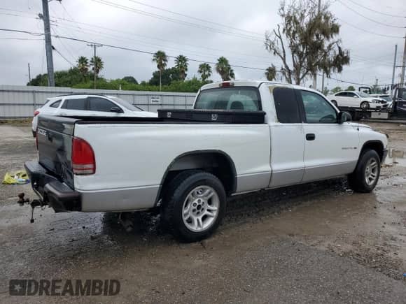 ✅ 2001 Dodge Dakota • VIN: 1B7GL22X71S271056 • Лот: 70401814. Размещён на Copart с пробегом 199 952 миль миль. Получите бесплатный доступ к архиву аукционных продаж из США и посмотрите подробный отчёт об истории автомобиля на DreamBid. Изображение 3.