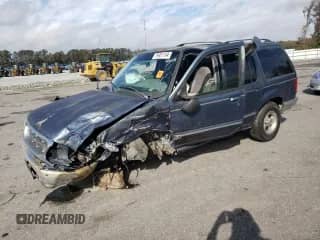 1998 Ford Explorer XLT z VIN 1FMZU32P3WZB05199, wystawiony jako Copart lot #79951194 z przebiegiem 209 673 mil mil oraz Szkoda całkowita • Salvage title. Historia ofert i sprzedaży dostępna na DreamBid. Obrazek 1.