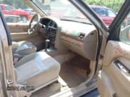 ✅ 2002 Nissan Pathfinder SE • VIN: JN8DR09Y12W745845 • Lot: 42720257. Listed on IAAI with 272,653 mi. Free auction sales archive from the USA and detailed vehicle history report at DreamBid. Image 5.