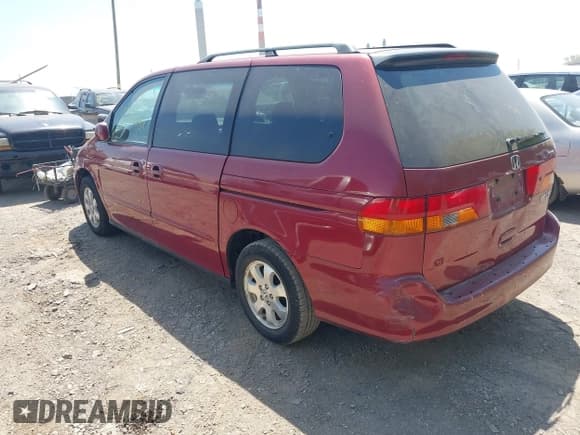 ✅ 2004 Honda Odyssey EX-RES • VIN: 5FNRL18814B099854 • Lot: 42123484. Listed on IAAI with 206,018 mi. Free auction sales archive from the USA and detailed vehicle history report at DreamBid. Image 3.