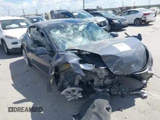 ✅ 2023 Tesla Model 3 • VIN: 5YJ3E1EA0PF569044 • Lot: 43295052. Listed on IAAI with 15 mi. Free auction sales archive from the USA and detailed vehicle history report at DreamBid. Image 1.