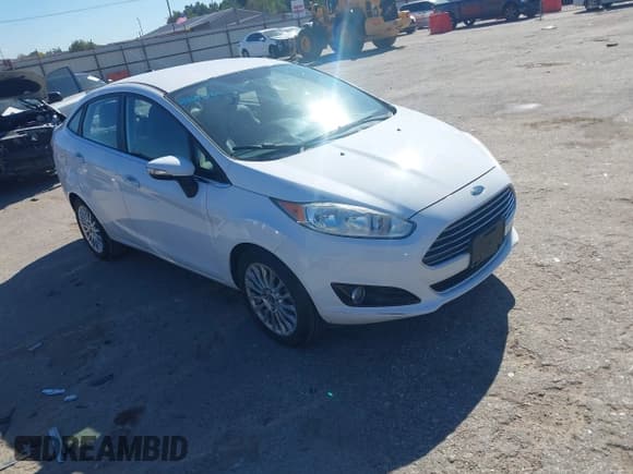 ✅ 2014 Ford Fiesta Titanium • VIN: 3FADP4CJ9EM134881 • Лот: 43635765. Опубликован ранее на IAAI с пробегом 75 687 миль. Бесплатный доступ к архиву аукционных продаж из США и подробный отчёт об истории автомобиля на DreamBid. Изображение 1.