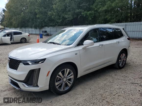 ✅ 2023 Cadillac XT6 FWD Premium Luxury • VIN: 1GYKPCRS2PZ109943 • Lot: 70635315. Listed on Copart with 26,405 mi. Free auction sales archive from the USA and detailed vehicle history report at DreamBid. Image 1.