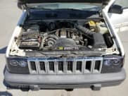 ✅ 1994 Jeep Grand Cherokee Laredo • VIN: 1J4GZ58S6RC310800 • Лот: 64095725. Опубликован ранее на Copart с пробегом 241 876 миль. Бесплатный доступ к архиву аукционных продаж из США и подробный отчёт об истории автомобиля на DreamBid. Изображение 11.