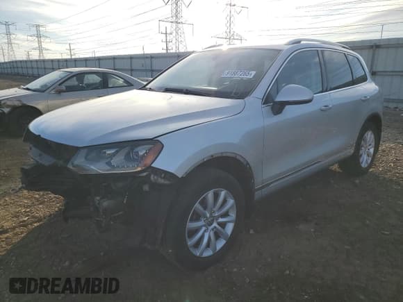 ✅ 2012 Volkswagen Touareg Sport • VIN: WVGFF9BP4CD004679 • Lot: 91887265. Listed on Copart with 113,466 mi. Free auction sales archive from the USA and detailed vehicle history report at DreamBid. Image 1.